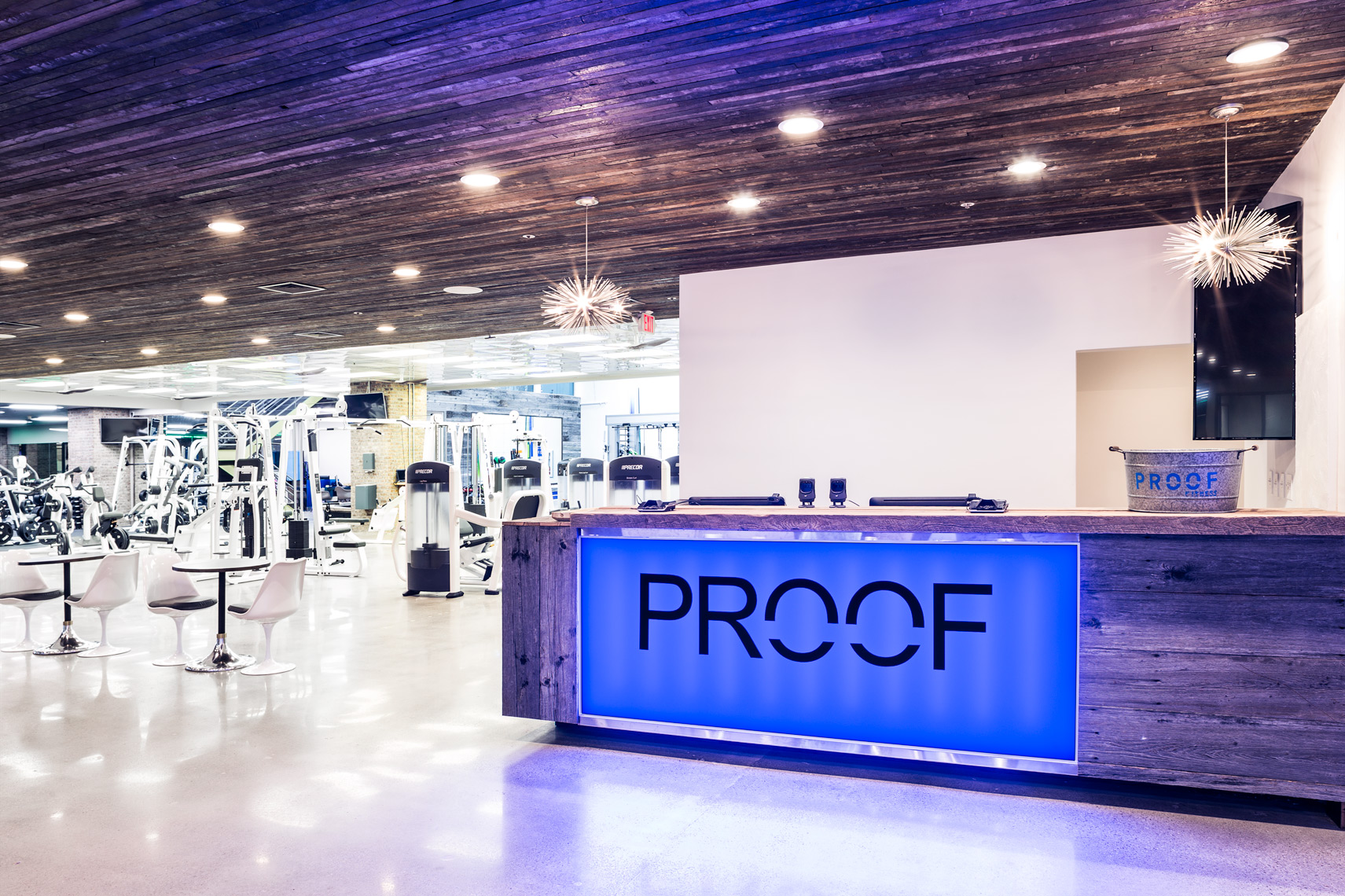 Reception area and machines at Proof Fitness