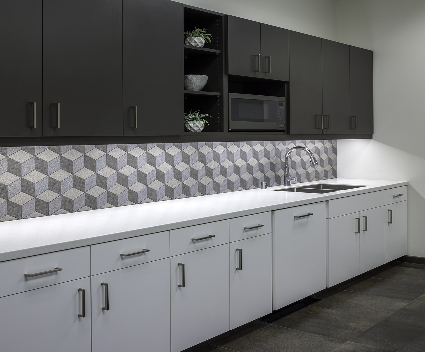 contemporary kitchen detail with geometric tile backsplash