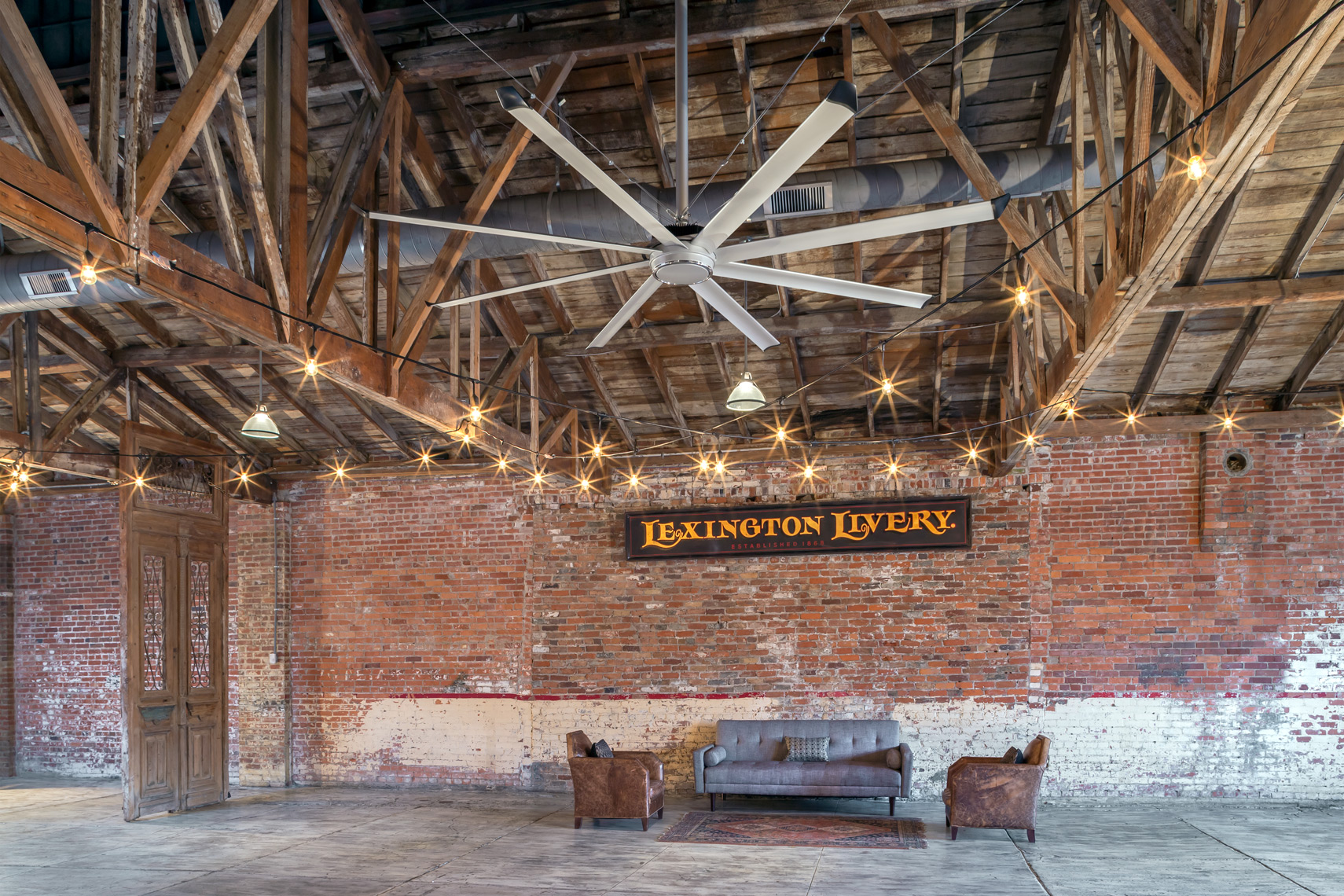 historic urban livery renovated to event space with fan