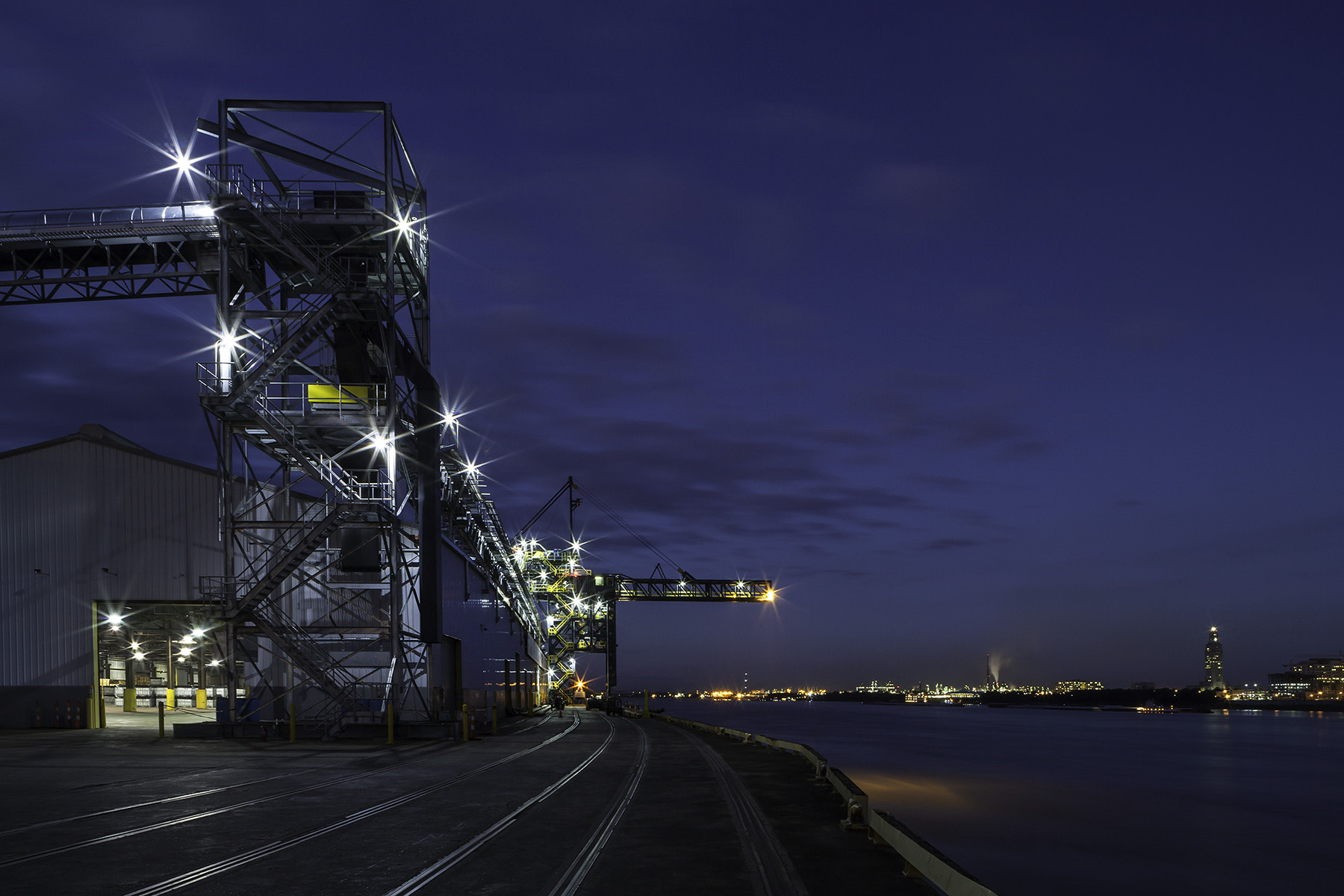 docks and shiploader at night on Drax Biomass site