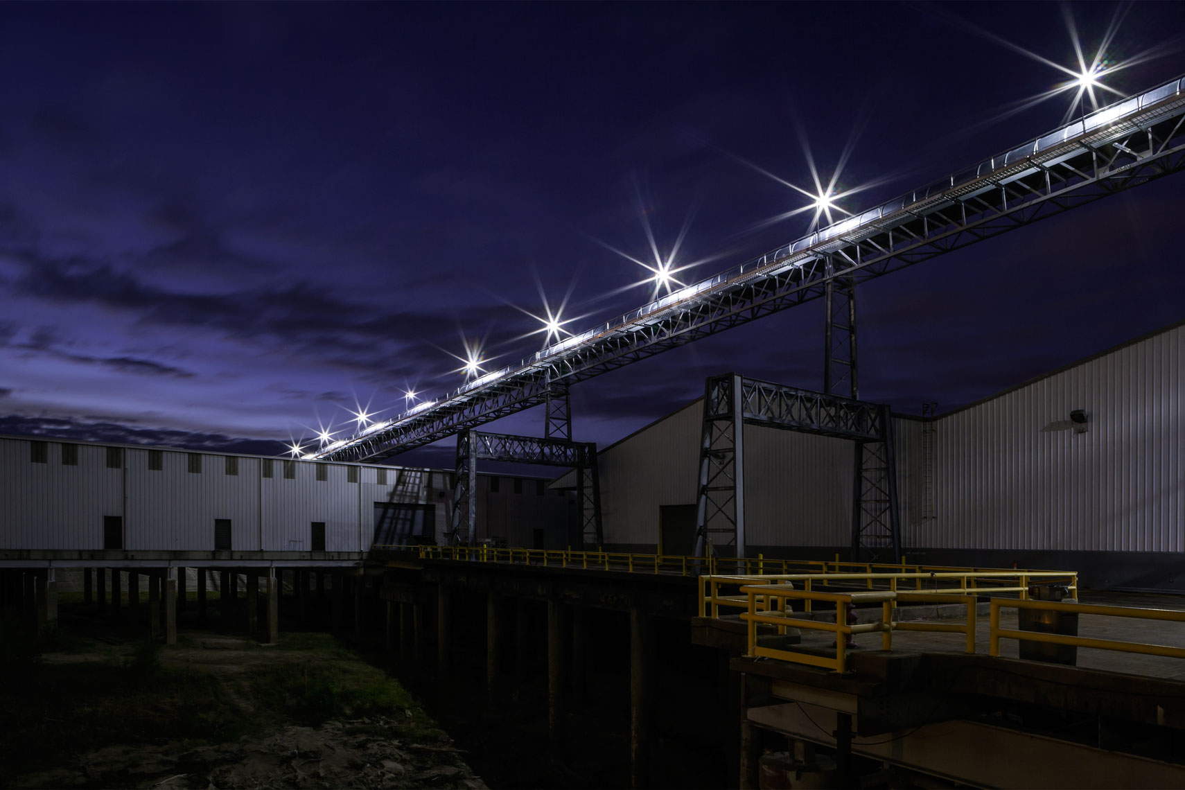 conveyor at night on Drax Biomass site