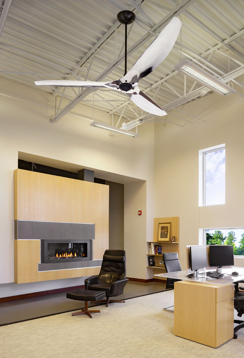 executive office suite with fireplace and chrome ceiling fan