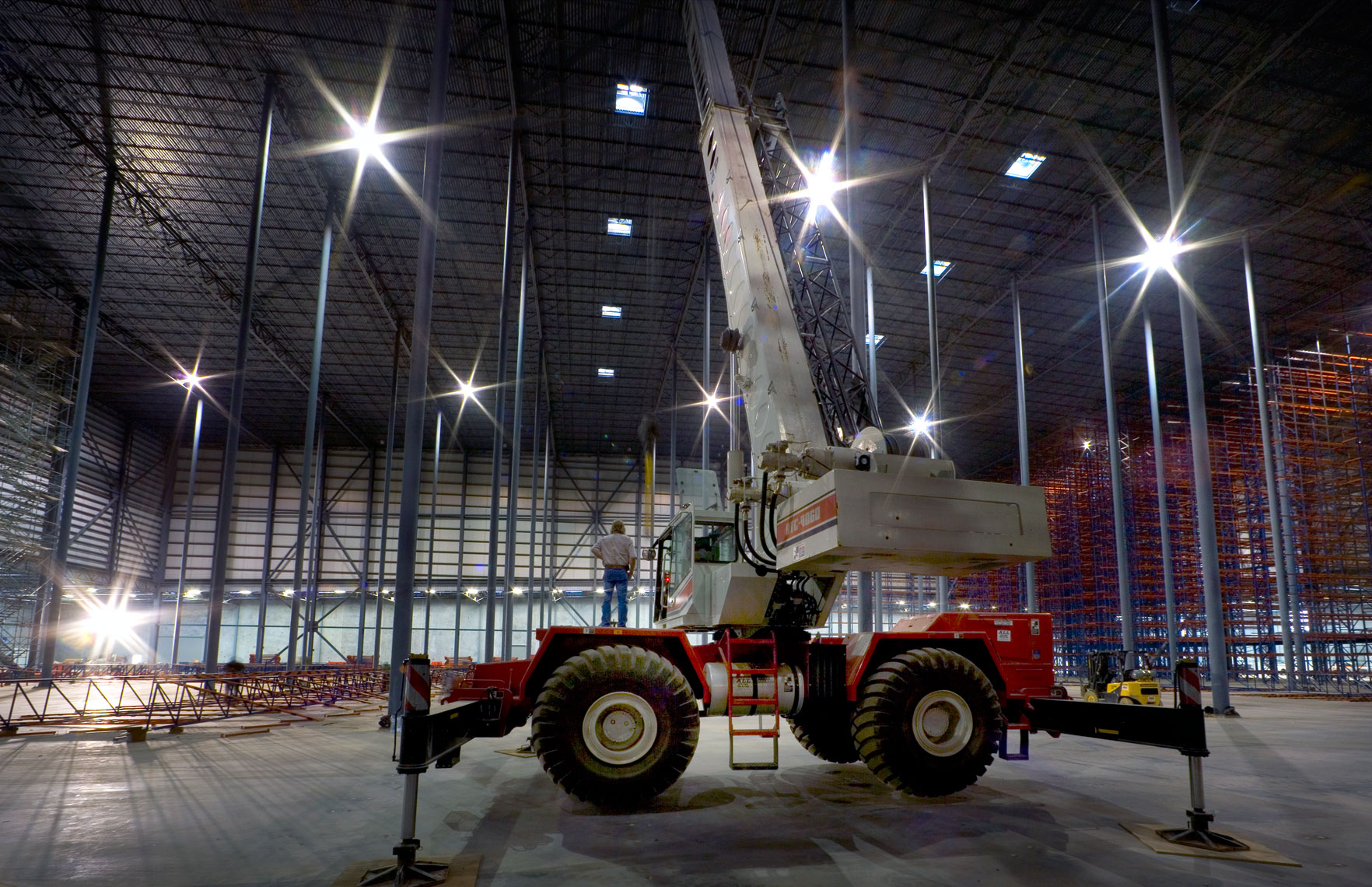 IKEA 160 foot high bay construction with crane operator
