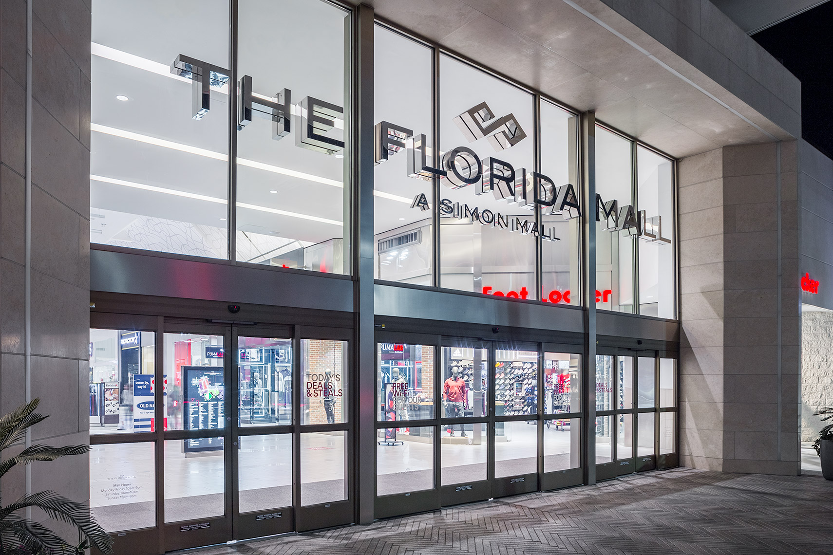 glass entry and signage at florida mall