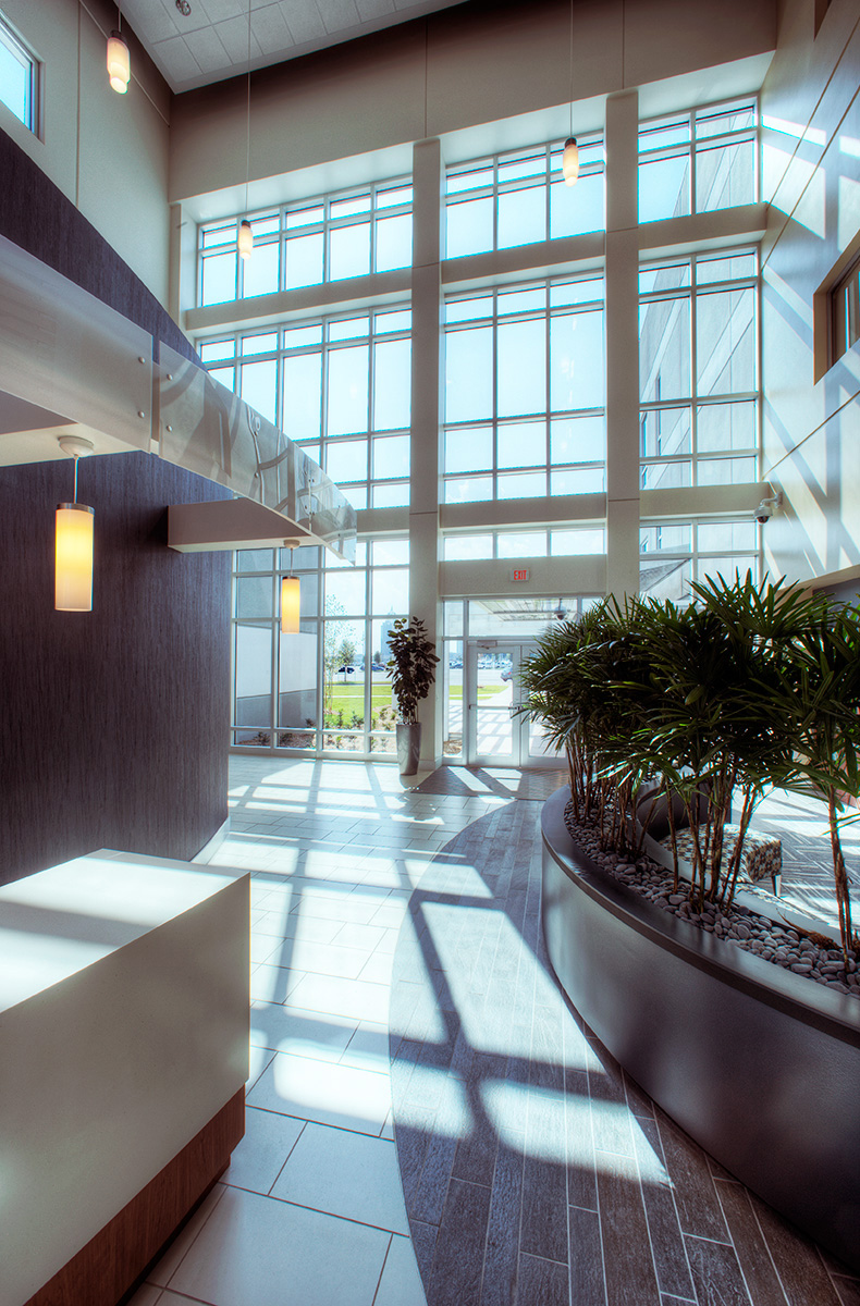Detail of Sunlit atrium and reception at Austal USA