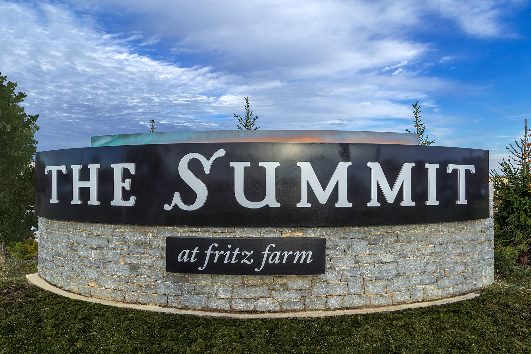 curved monument sign at the summit fritz farm lexington
