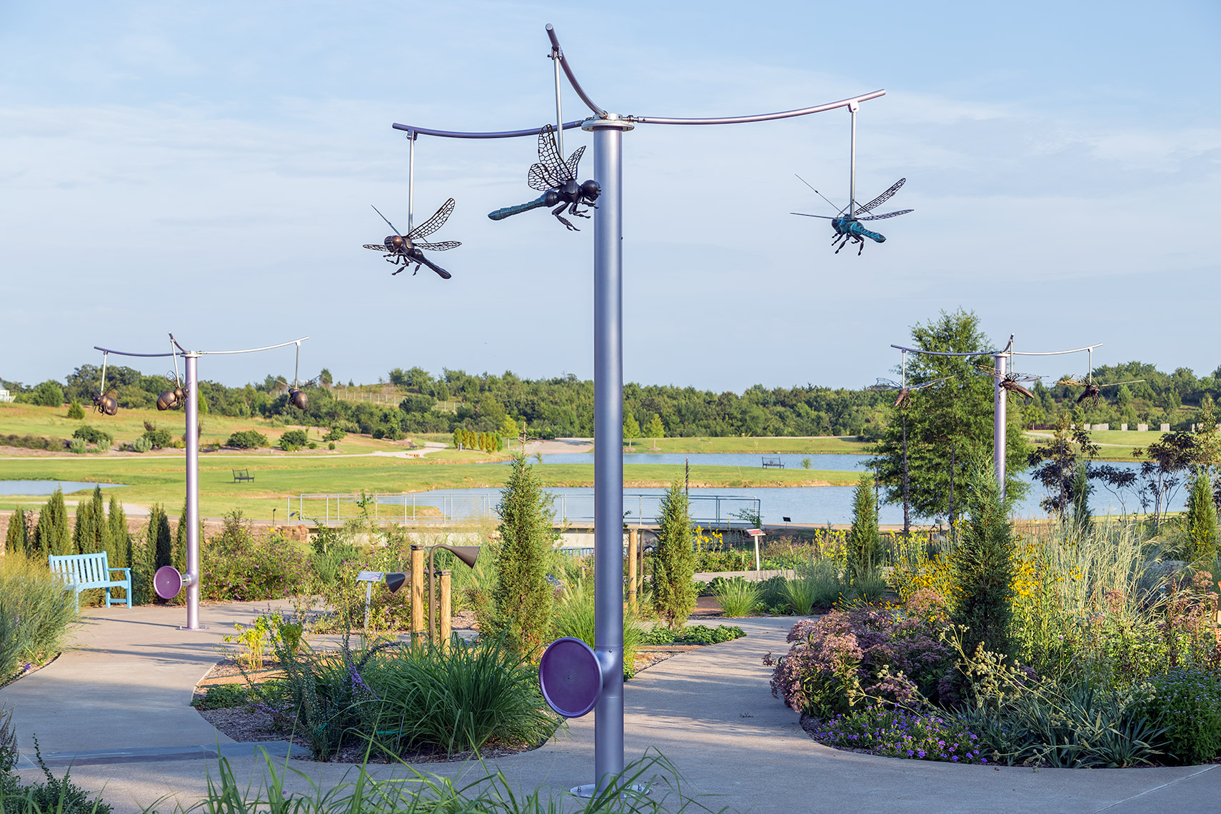 interactive dragonfly sculpture at tulsa botanic garden
